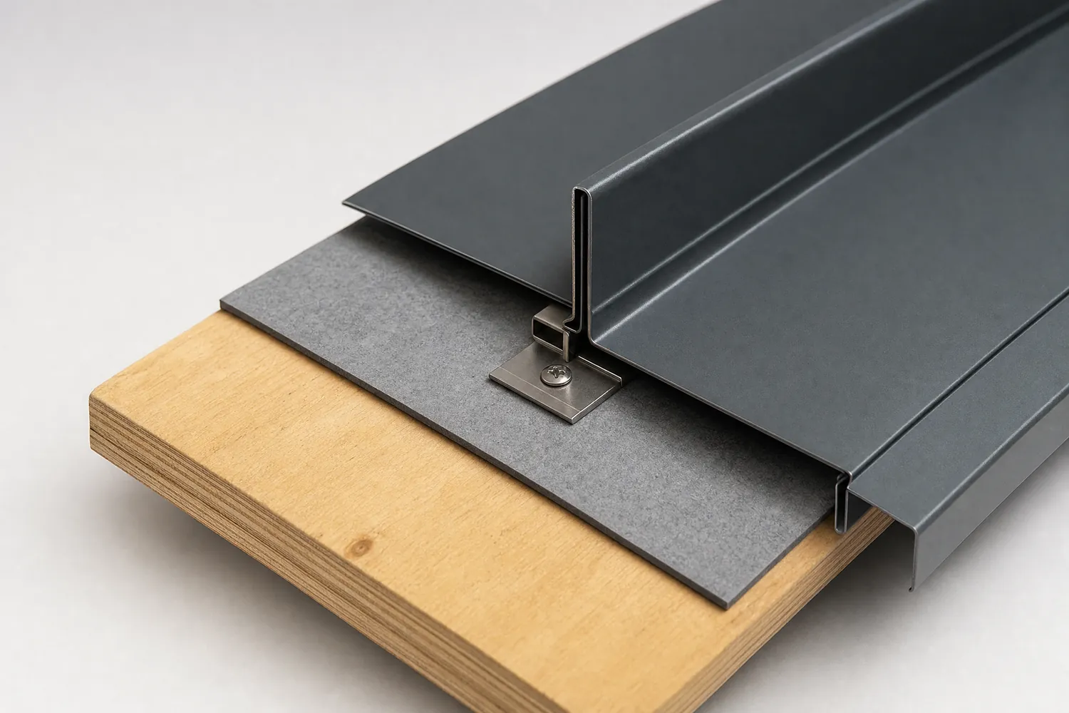 Cut-away of a standing seam metal roof: plywood deck, high-temp underlayment, eave trim, concealed clip, standing seam panel (illustrative rendering)